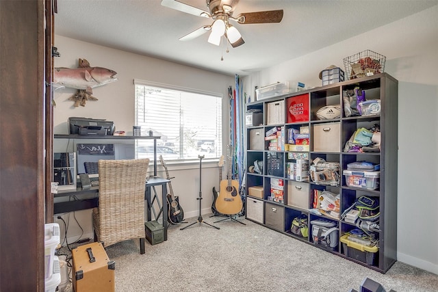 office featuring carpet flooring and ceiling fan