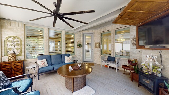 living room with light wood-type flooring and ceiling fan