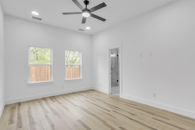 unfurnished room with ceiling fan and light hardwood / wood-style flooring