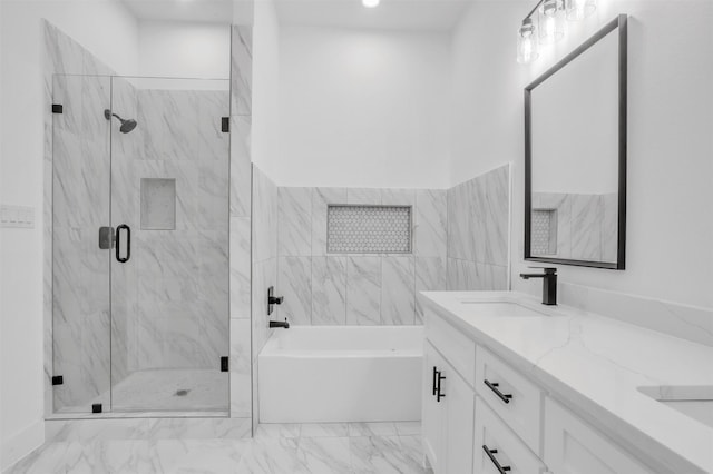 bathroom with separate shower and tub and vanity