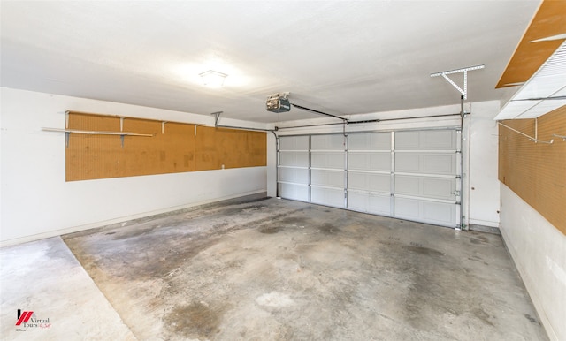 garage featuring a garage door opener