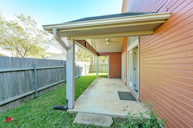 view of patio featuring ceiling fan