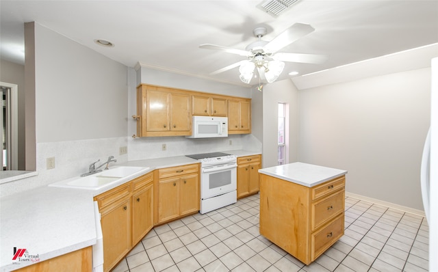 kitchen with ceiling fan, sink, light tile patterned floors, white appliances, and a kitchen island