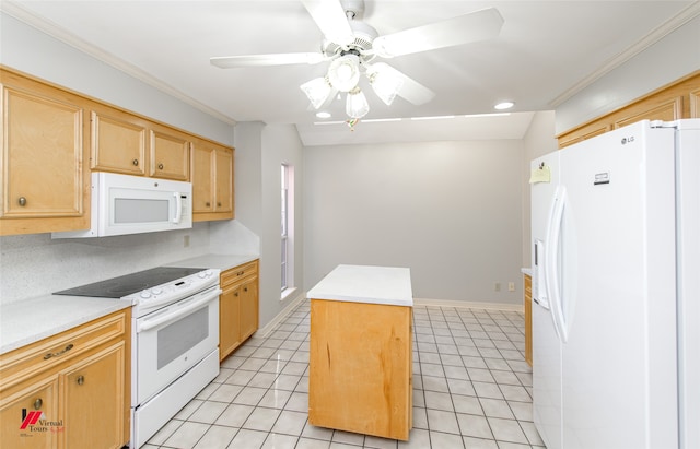 kitchen featuring vaulted ceiling, a center island, white appliances, and ornamental molding