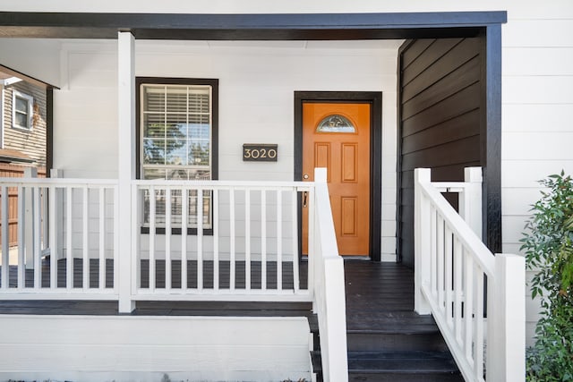 entrance to property with a porch