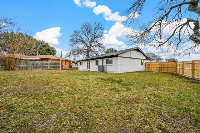 view of yard featuring central AC