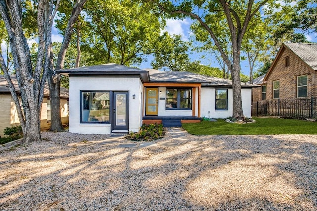 view of front of home with a front yard