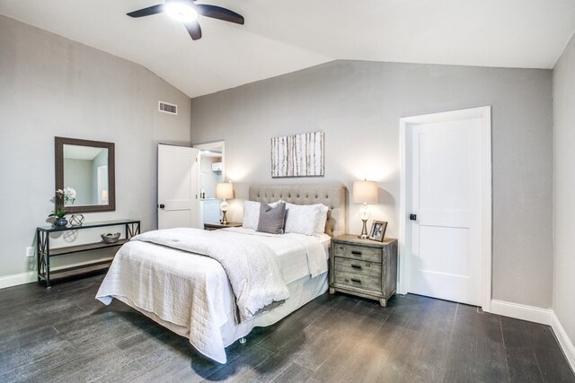 bedroom with ceiling fan, dark hardwood / wood-style floors, and lofted ceiling