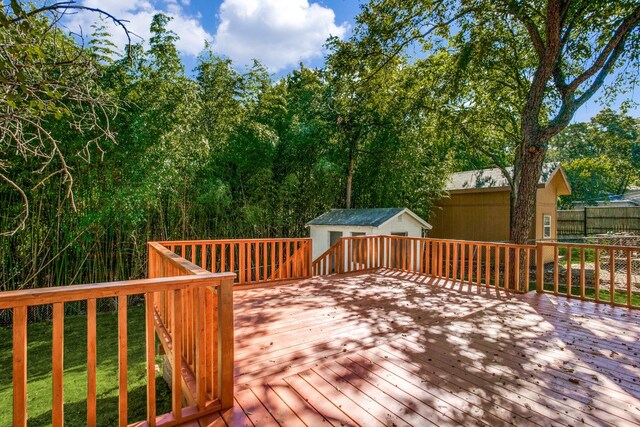 deck featuring an outbuilding