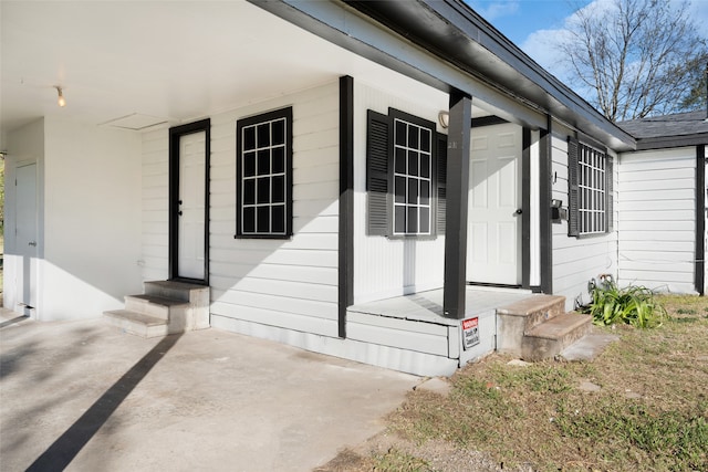 entrance to property with a porch