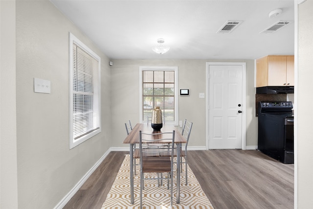 dining room with light wood-type flooring