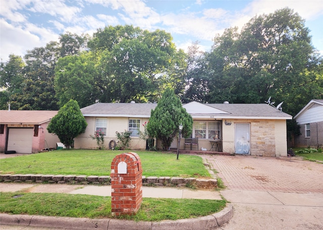 ranch-style house with a front lawn