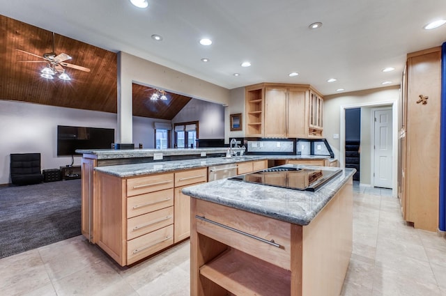 kitchen featuring kitchen peninsula, light tile patterned floors, a kitchen island, and vaulted ceiling