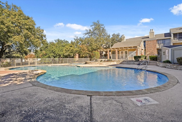 view of pool featuring a patio