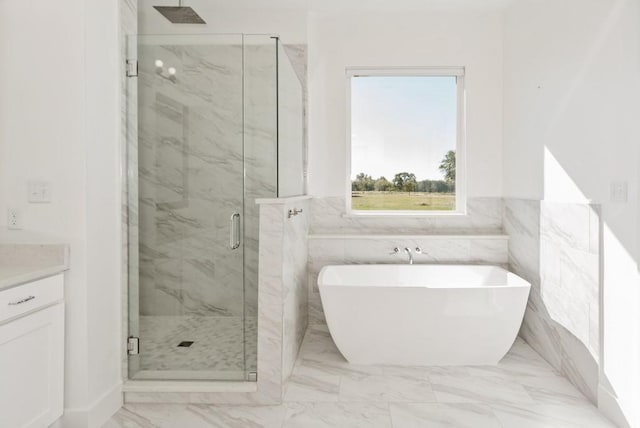 bathroom with vanity and plus walk in shower