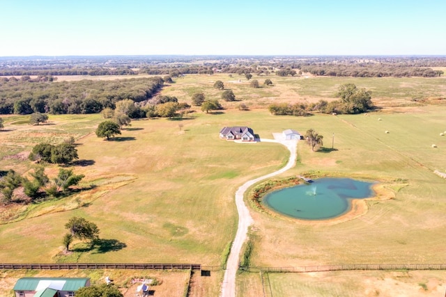 aerial view with a water view and a rural view