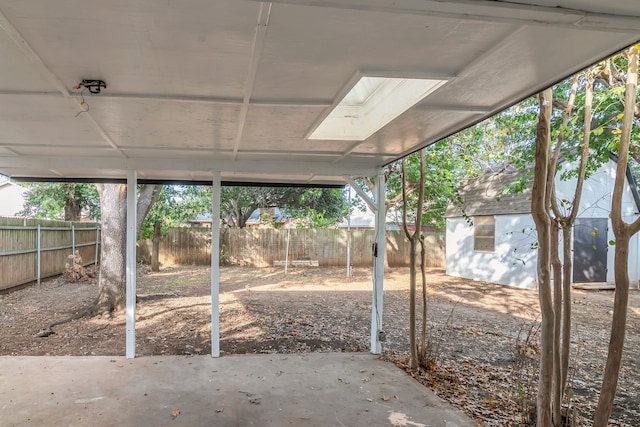 view of patio / terrace featuring a shed