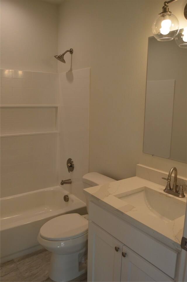 full bathroom with vanity, shower / bathtub combination, and toilet