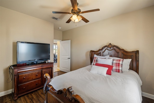 bedroom featuring ceiling fan and dark hardwood / wood-style flooring