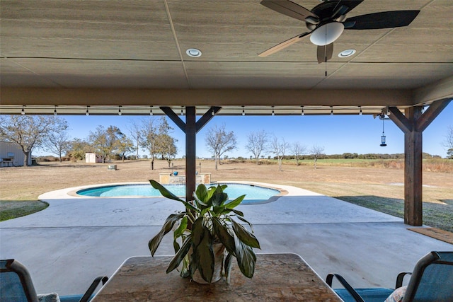 view of swimming pool featuring a patio