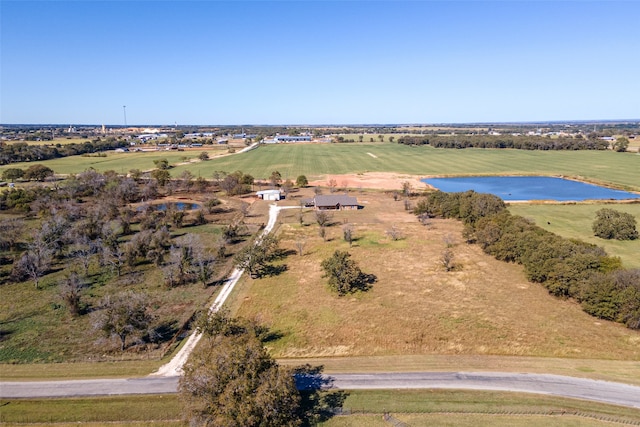 bird's eye view featuring a rural view and a water view