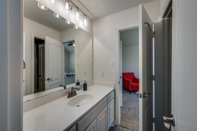 bathroom with vanity and ceiling fan