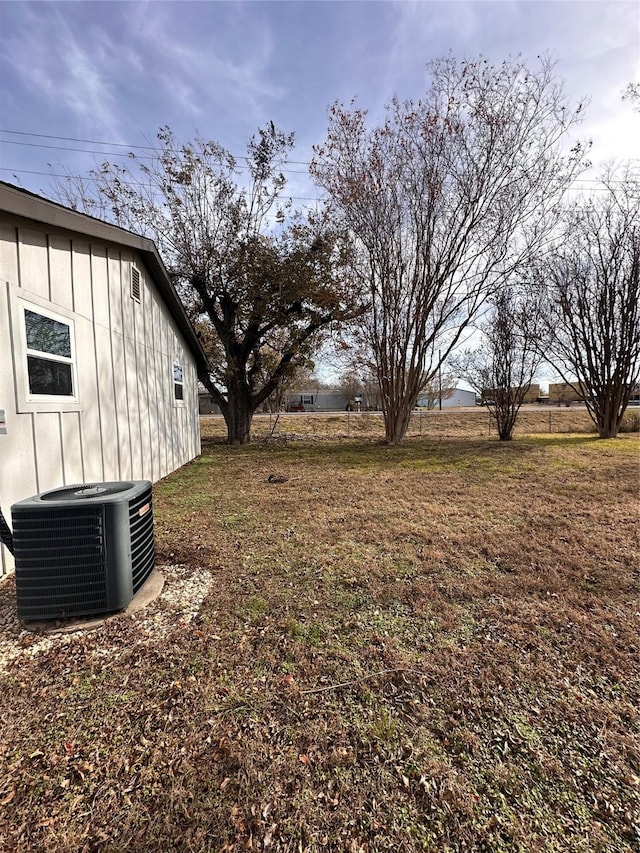 view of yard with central AC