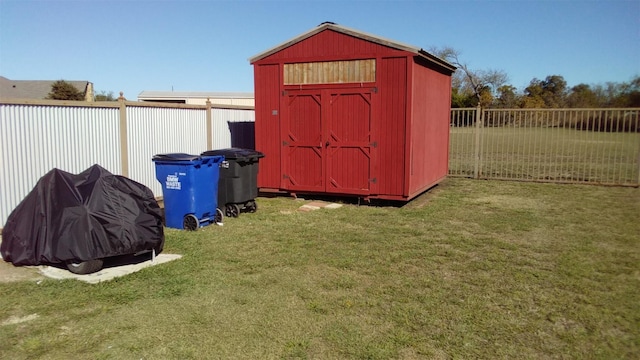 view of outbuilding featuring a yard