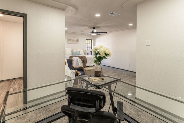 interior space featuring ceiling fan