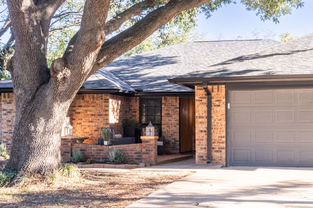 ranch-style house featuring a garage