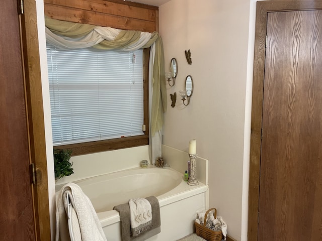 bathroom featuring a tub