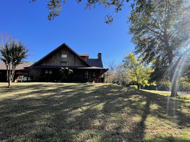 view of home's exterior featuring a yard