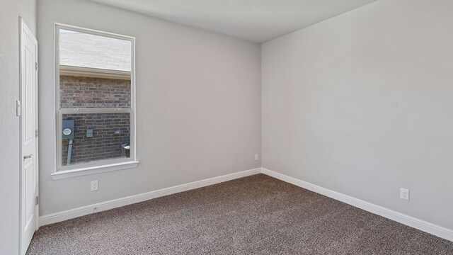 unfurnished room with carpet