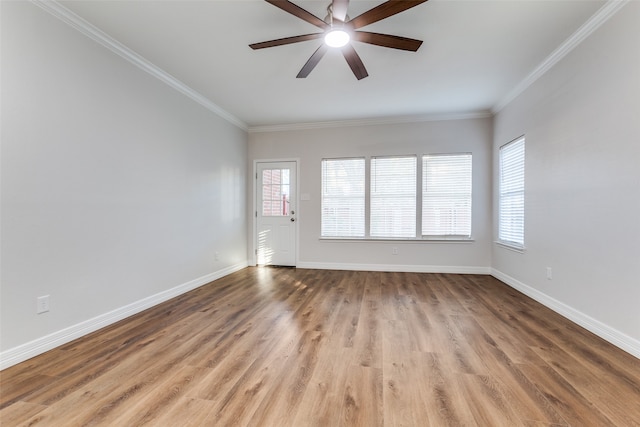 unfurnished room with crown molding, ceiling fan, and light hardwood / wood-style floors