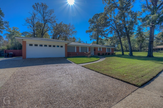 ranch-style house with a front yard and a garage