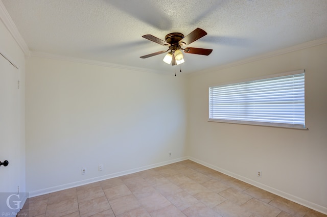 spare room with crown molding, ceiling fan, and a textured ceiling