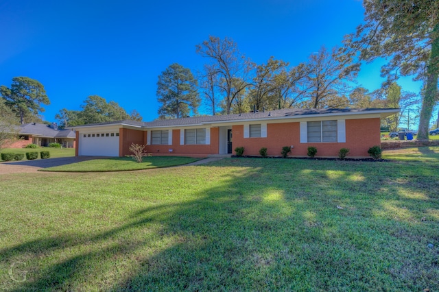 ranch-style house with a garage and a front lawn