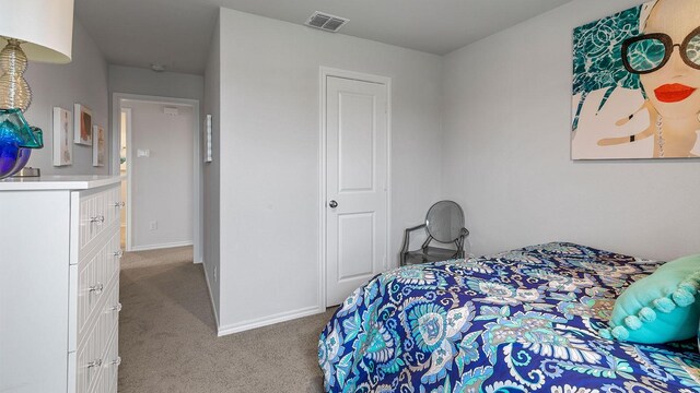 bedroom with light carpet