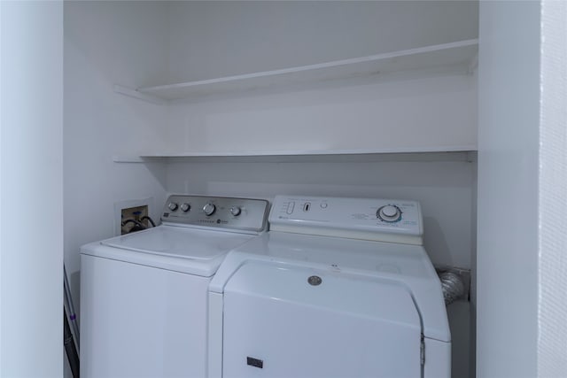 washroom featuring separate washer and dryer