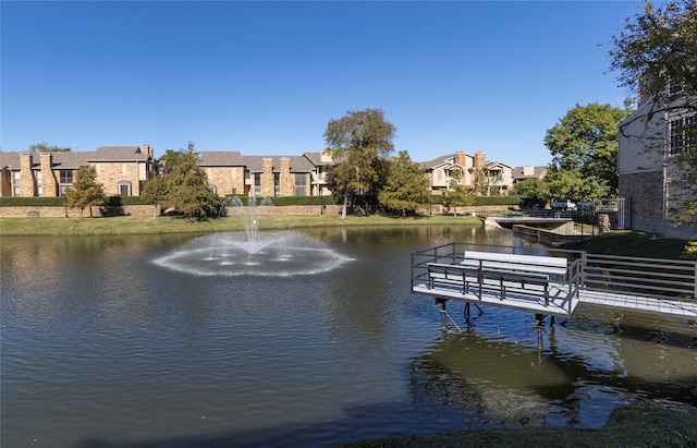 exterior space with a water view