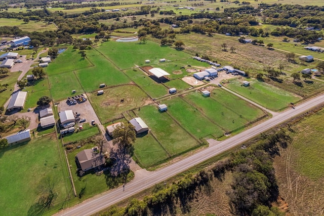 birds eye view of property featuring a rural view