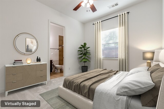 bedroom with ensuite bathroom, ceiling fan, and light colored carpet