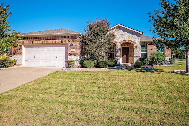 ranch-style house with a garage and a front lawn