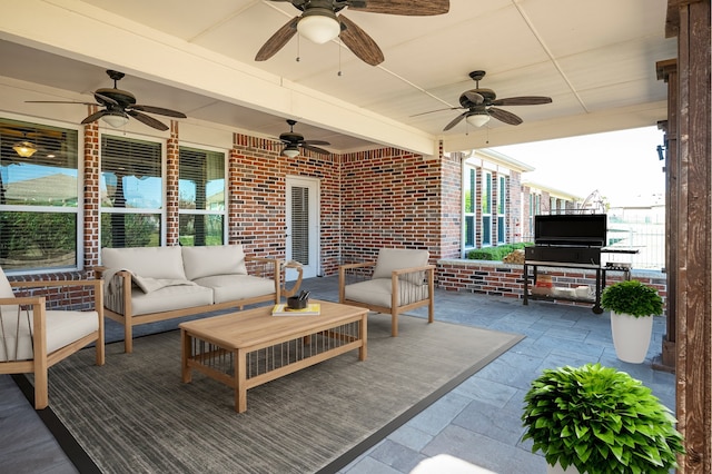 view of patio featuring ceiling fan and an outdoor hangout area