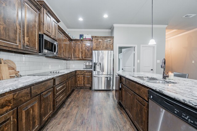 unfurnished dining area featuring plenty of natural light, dark hardwood / wood-style floors, and ornamental molding