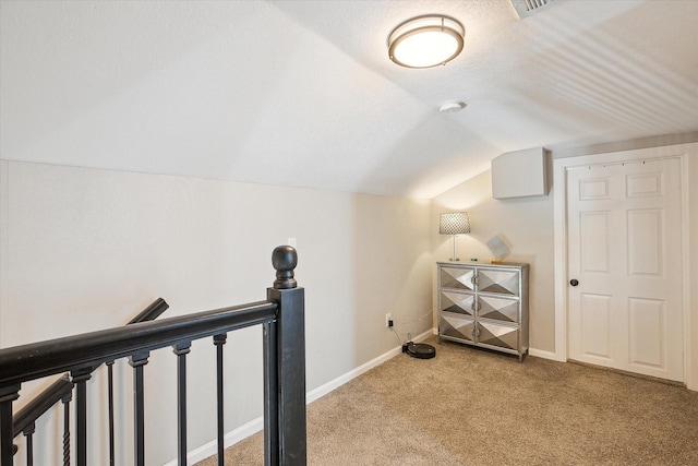2505 Westbrook Ave, Fort Worth, TX 76111 - additional living space featuring carpet, vaulted ceiling, and baseboards
