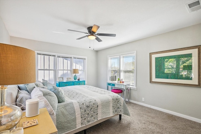 bedroom with ceiling fan and carpet floors