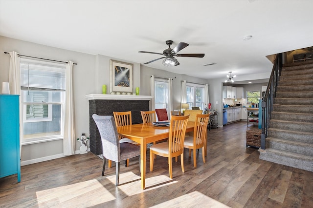 dining room featuring dark wood-type flooring and ceiling fan