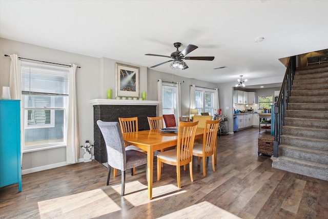 2505 Westbrook Ave, Fort Worth, TX 76111 - dining space featuring stairway, ceiling fan, dark wood finished floors, and baseboards