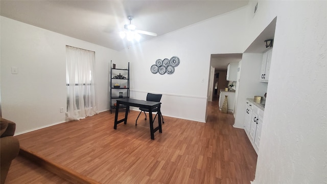 office area with ceiling fan and hardwood / wood-style floors